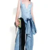 ACID WASH BOYFRIEND TROUSERS WITH BIG BOW