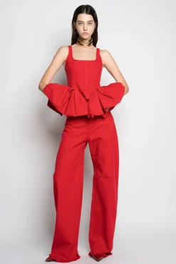 RED CORSET WITH PLEATED HIP PANELS