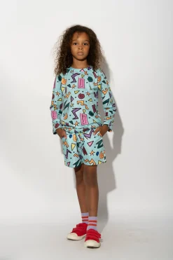 TURQUOISE SQUIGGLE PRINT LONG SLEEVE SWIM TOP