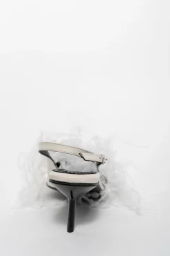 WHITE FEATHER SLING BACKS