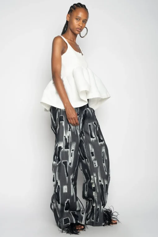 WHITE SLEEVELESS PUFF HEM TOP
