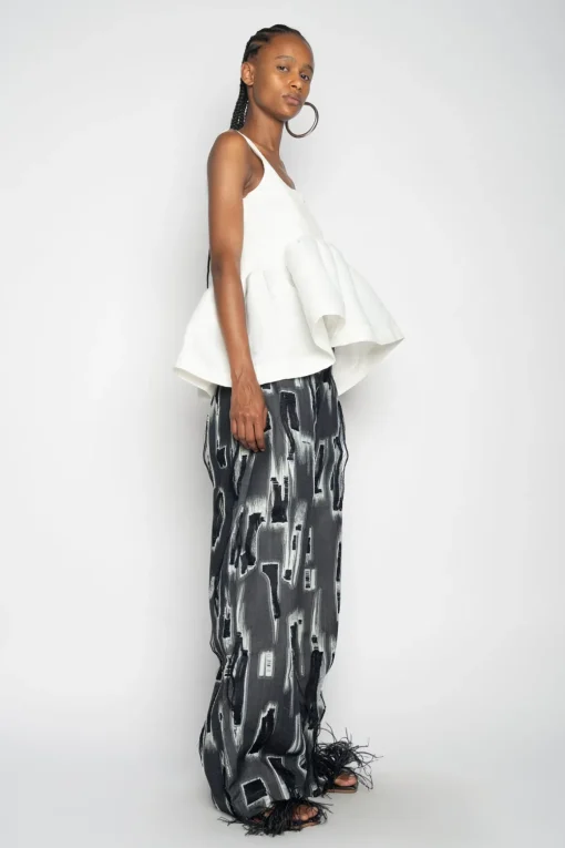 WHITE SLEEVELESS PUFF HEM TOP