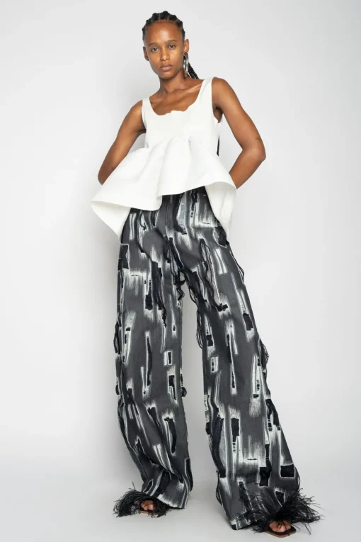 WHITE SLEEVELESS PUFF HEM TOP