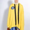 YELLOW ASYMMETRIC HOODIE WITH BIG EYELET