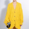 YELLOW OVERSIZED CARDIGAN WITH FEATHERS PULLS